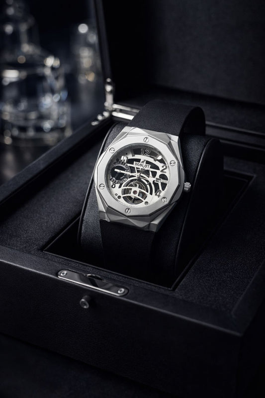 Hublot Style Skeleton Dial Watch with Silver Octagonal Bezel and Black Rubber Strap